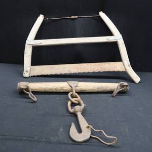 lot 96 image: VINTAGE YOKE  AND BUCK  SAW