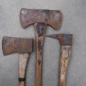 lot 97 image: A PICK, AN AXE,AND A HATCHET