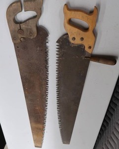 lot 107 image: ANTIQUE WHEAT HANDLED HAND SAW PLUS LARGE ICE SAW