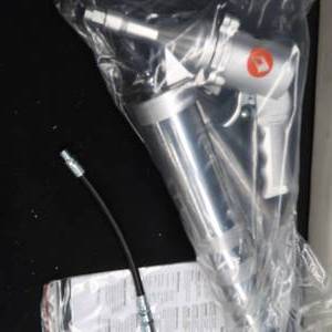 lot 166 image: NEW OIN BOX GREASE GUN PLUS