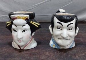 Pair Of Bust Mugs