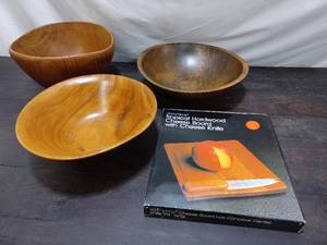 Three Wood Bowls And A Cheese Board
