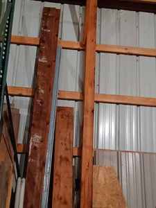 Assorted Lumber including 2 X 4s, 2 X 6s, and 2 X 8s, Chipboard and Plywood Pieces, and Heavy-Duty Wood Blocking