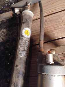 Grease Gun and Two Manual Tire Pumps