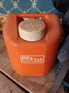 Hiking Back Pack and a Gott Tip-N-Tap Cooler Jug