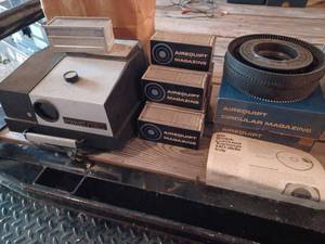 Vintage Airequipt Slide Projector with Vintage Airequipt Circular Magazines in Original Boxes, and Several Airequipt Magazines in Original Boxes