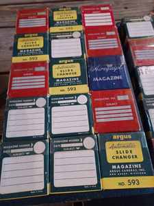 30 Assorted Vintage Slide ChangersMagazines in a Vintage Baja Carrying Case