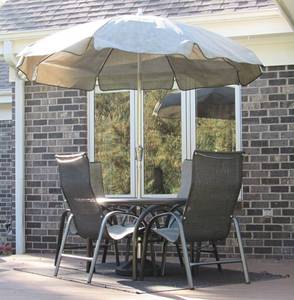 7 piece Patio Table set with umbrella and chairs