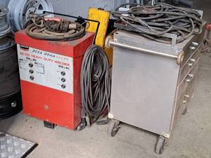 lot 1003 image: Century Five Star AC-DC Heavy Duty 250295 Amp Welder with Cart and Welding Rods