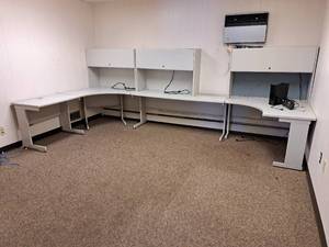 lot 1031 image: Office Cubicle - (4) Desks, (3) Upright Cabinets