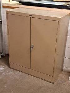 lot 1034 image: Anderson Hickey Co Metal Storage Cabinet 2-door3-shelf