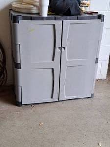 lot 1068 image: Rubbermaid Plastic Storage Cabinet 2-door