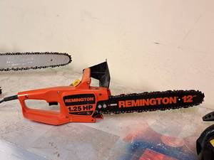 lot 1083 image: Remington LNT-2 1.25-HP 12 Electric Chainsaw