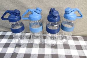 lot 150 image: Lot of 4 Re-Sealable 1.5L Jugs with Handles