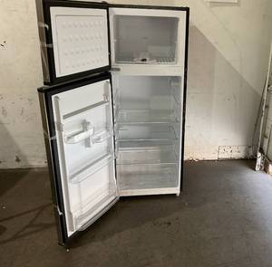 lot 54 image: RCA 7.5 cf ft Stainless 2-Door Apartment Size Refrigerator with Freezer - READ