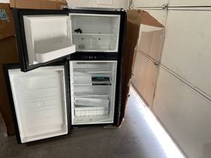 lot 55 image: Norcold 7 cu ft Polar N7X Series 2-Way ACLP RV Refrigerator with Fan - DAMAGED