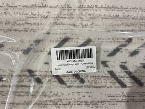 lot 243 image: Living Room Area Rug - Boho Chic Cream Gray