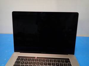 lot 8 image: Apple&nbspMacBookPro14,3 A1707 MPTR2LLA &nbspINTEL(R) CORE(TM) I7-7700HQ CPU  2.80GHZ  16GB DDR4 SDRAM  251GB SSD  15 screen with 3360 x 2100 2K resolution  Includes IOS  No charger