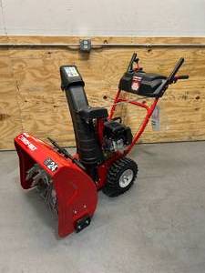 lot 2 image: TROY-BILT Storm 24 in. 208 cc Two- Stage Gas Snow Blower with Electric Start Self Propelled