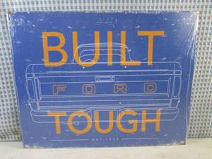 lot 19 image: (C-2) Built Ford Tough Tin Sign - N...