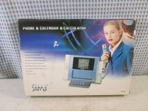 lot 59 image: (C-4) Simi Phone and Calendar and C...