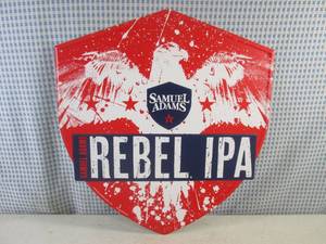 lot 144 image: (RM2) Samuel Adams Rebel IPA Tin Ba...