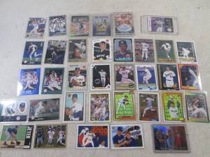 lot 214 image: (EC1) Assorted Sports Cards - Mostl...