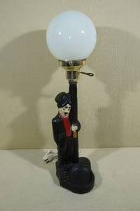 lot 60 image: Vintage Charlie Chaplin Hobo Drunk Leaning on Lamp Post Chalkware