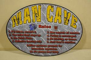 lot 79 image: Man Cave Raised Metal Sign