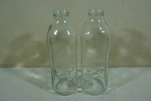 lot 93 image: 2 Vintage Glass Milk Jugs