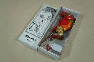 lot 95 image: Vintage Tin Litho Climbing Monkey Toy