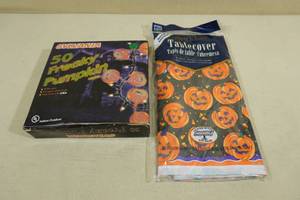 lot 121 image: IndoorOutdoor Pumpkin Lights with Tablecover