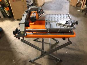 RIDGID 9 Amp 7 in. Blade Corded Wet Tile Saw with Stand  Customer Returns See Pictures