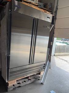 Norpole NP2F 54.00 Two Section Solid Door Reach-In Freezer and like new working conditions LOW RESERVE OF $1500.00 retail are $3300 units have some dents or scratches please review the photos