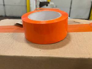lot 60 image: Orange Tape Rolls and Blue Tape Roll