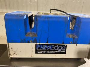 lot 16 image: Cozzin Prime Edge Electric Sharpening System