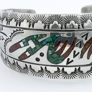 lot 24 image: Wilson & Carolyn Begay & Cortez H Sterling Cuff Bracelet. Inlaid Turquoise & Coral Mosaic.