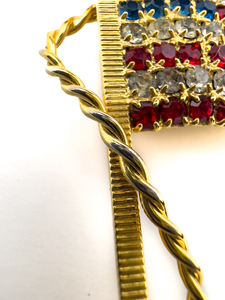 lot 67 image: American Flag, Unknown Maker, Yellow Base Metal Brooch .