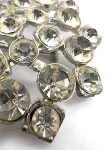 lot 71 image: Rhinestone Snowflake, White Base Metal Brooch .