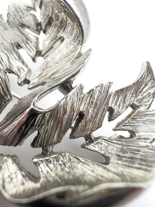 lot 123 image: Maple Leaf, White Base Metal Brooch.