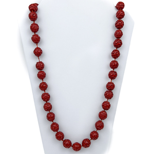 lot 26 image: Cinnabar Jewelry suite, Floral & Scroll Motif Bead Necklace. Two Bangles, Leverback Earrings & Ring