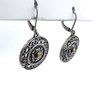 lot 47 image: Pierced Filigree, Unknown Metal Lever back Pierced Earrings. Round Yellow Center