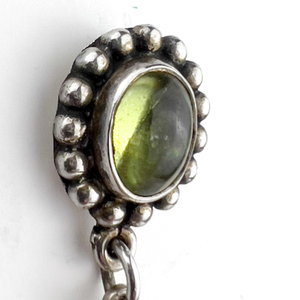 lot 103 image: TJT Sterling Silver Post Back Pierced Earrings. Peridot And Quartz Dangles.