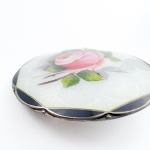 lot 22 image: O.F. Hjortdahl (Norway) Guilloche Enamel With Pink Rose Over White Sterling Silver Brooch.