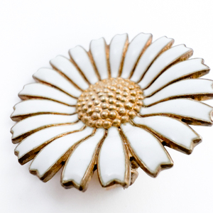 lot 25 image: Georg Jensen (Denmark) White Enamel Daisy Flower Yellow Plated Sterling Silver Brooch.