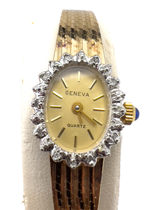 lot 138 image: Geneva, Gem Set bezel, yellow Stainless steel & base metal Quartz Analog watch. New Battery