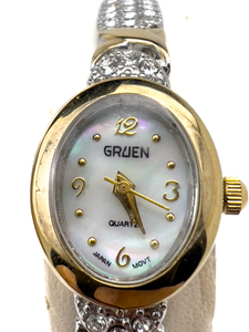 lot 32 image: Gruen Two-Tone GR8702, Mother of Pearl Dial & Rhinestone Bracelet Quartz Analog watch. New Battery