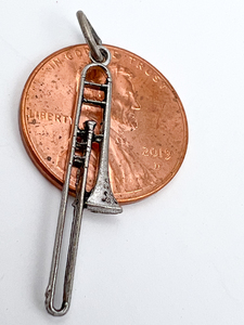 lot 134 image: VINTAGE Griffith Charms trombone, Sterling Silver Charm.