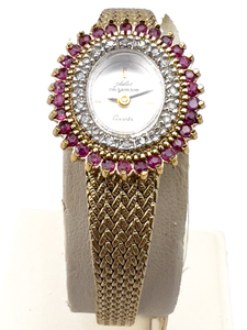 lot 144 image: Ladys Jules Jrgensen Ruby, Diamond Bezel Quartz Analog watch. New Battery Installed
