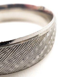 lot 181 image: Wedding Ring Sample Florentine Rhodium Plated Jeweler Alloy Ring. Size 9.75 - 10.